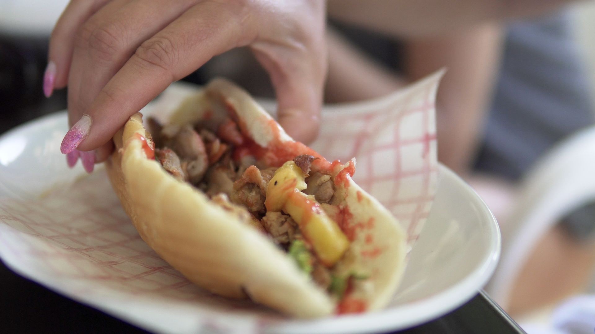 Doner kebab sandwich on plate, cinematic dof